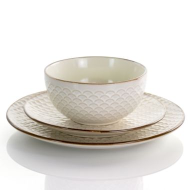 Elama Honey Ivory 16 Piece Stoneware Dinnerware Set in Ivory. View a larger version of this product image.
