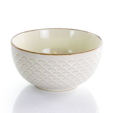 Elama Honey Ivory 16 Piece Stoneware Dinnerware Set in Ivory. View a larger version of this product image.