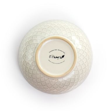 Elama Honey Ivory 16 Piece Stoneware Dinnerware Set in Ivory. View a larger version of this product image.