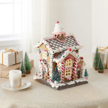 Kurt Adler Battery-Operated Light-Up Gingerbread House Table Piece, 14". View a larger version of this product image.