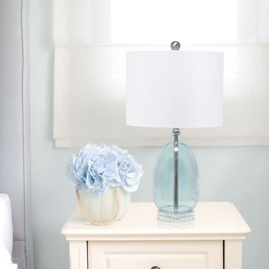 Lalia Home Oval Glass Table Lamp with White Drum Shade. View a larger version of this product image.