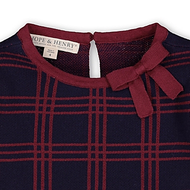 Hope & Henry Girls&#39; Bow Detail Sweater Dress (Navy and Berry Plaid, 12-18 Months). View a larger version of this product image.