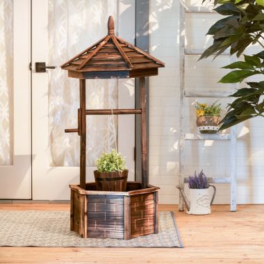 Accent Plus Rustic Wishing Well Planter. View a larger version of this product image.