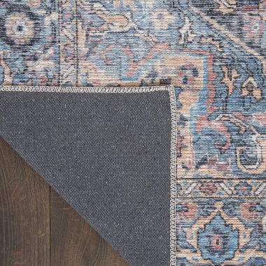 Nicole Curtis Machine Washable Series 1 Vintage Indoor Area Rug Light Blue Multi 6' x 9'. View a larger version of this product image.