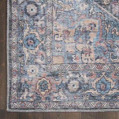 Nicole Curtis Machine Washable Series 1 Vintage Indoor Area Rug Light Blue Multi 6' x 9'. View a larger version of this product image.