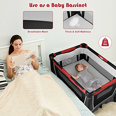 Costway 4-in-1 Convertible Portable Baby Play yard with Toys and Music Player-Red. View a larger version of this product image.