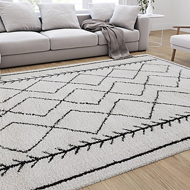 Merrick Lane 8&#39; x 10&#39; Ivory and Black Geometric Style Bohemian Shag Area Rug. View a larger version of this product image.