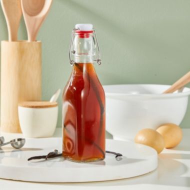 Juvale 8 oz Swing Top Glass Bottles with Stoppers for Juicing, Vanilla, Sauces, Oils (6 Pack plus Cleaning Brush). View a larger version of this product image.