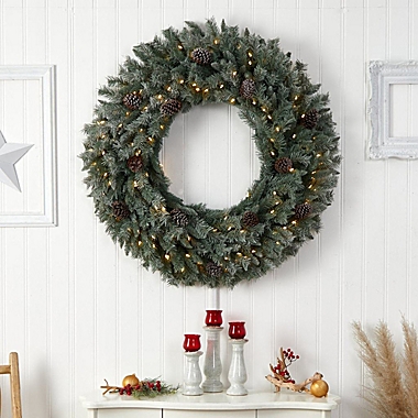 Nearly Natural 4&#39;D Large Flocked Artificial Christmas Wreath with Pinecones, 150 Clear LED Lights and 360 Bendable Branches. View a larger version of this product image.