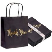 black white and gold gift bags