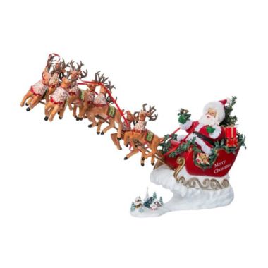 Now Dash Away All Musical Santa with Reindeer Fabriche Christmas Figurine Set. View a larger version of this product image.