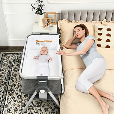 Costway Baby Bassinet Bedside Sleeper with Storage Basket and Wheel for Newborn-Gray. View a larger version of this product image.