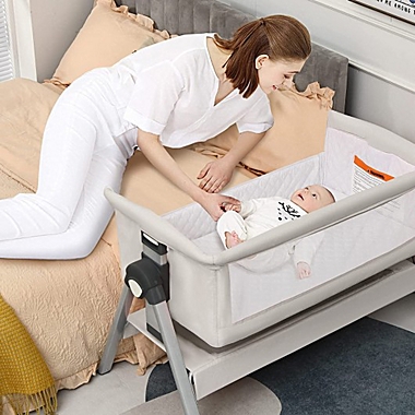 Costway Portable Baby Bedside Sleeper with Adjustable Heights and Angle. View a larger version of this product image.