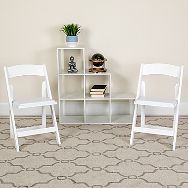 Emma + Oliver 2 Pack White Wood Folding Chair with Vinyl Padded Seat. View a larger version of this product image.