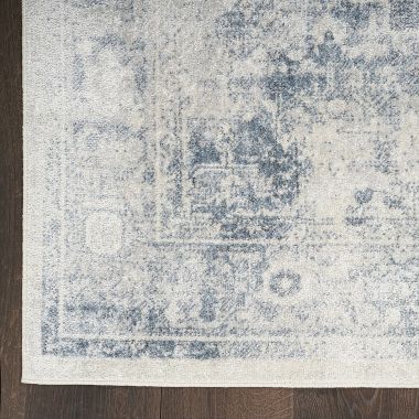 Nourison Astra Machine Washable Vintage Persian Indoor Rug Blue/Ivory 7'10" x 10'. View a larger version of this product image.