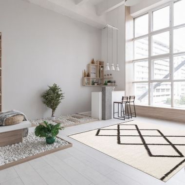 Chaudhary Living 7.75' x 10' Off White and Charcoal Gray Moroccan Rectangular Shag Area Throw Rug. View a larger version of this product image.