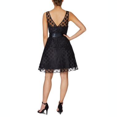Betsey Johnson Girl's Belted Polka Dot Sleeveless Illusion Neckline Above the Knee Fit Flare Party Dress Black Size 0. View a larger version of this product image.