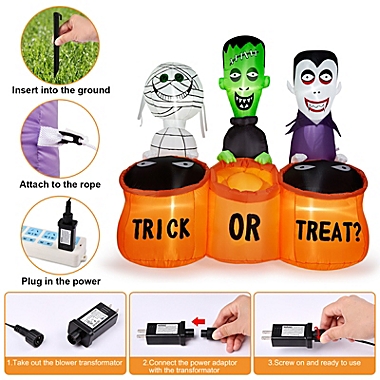 CAMULAND Halloween Inflatable Built-in LED Lights Blow Up Yard Decoration with Mummy, Vampire, Green-Faced Ghost and TRICK OR TREAT. View a larger version of this product image.