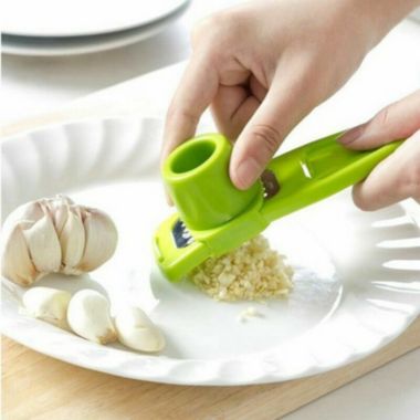 Kitcheniva Plastic Stainless Steel Garlic Press Chopper Green. View a larger version of this product image.