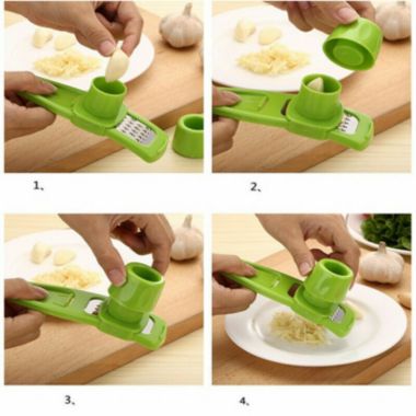 Kitcheniva Plastic Stainless Steel Garlic Press Chopper Green. View a larger version of this product image.