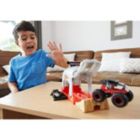 Alternate image 3 for Hot Wheels Monster Truck Pit & Launch Play Sets with Monster Truck and  1 64 car, Bone Shaker