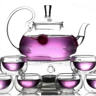 Slickblue 8-Piece Glass Teapot Set with 6 Glasses and Warmer. View a larger version of this product image.