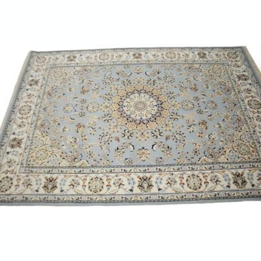 Light Blue Floral 5X7 Indo-Nain Oriental Rug. View a larger version of this product image.