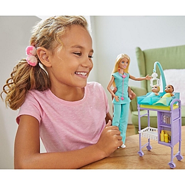 Barbie Careers Baby Doctor Playset With Blonde Doll, 2 Infant Dolls, Toy Pieces. View a larger version of this product image.