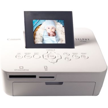 Canon Selphy CP1000 Compact Photo Printer White + 4pcs Canon KP-108IN Selphy Color Ink 4x6 Paper Set 3115B001. View a larger version of this product image.