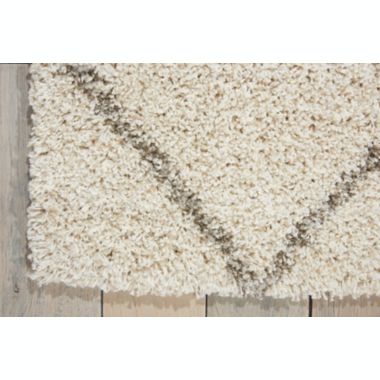 Nourison Brisbane Cream Shag Area Rug BRI03 5' x 7'. View a larger version of this product image.