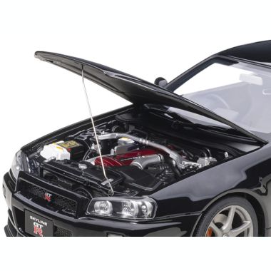 Carfaxo Nissan Skyline GT-R (R34) V-Spec II RHD (Right Hand Drive) Black Pearl 1/18 Model Car by Autoart. View a larger version of this product image.